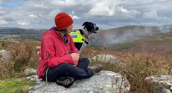 Catherine and Trainee Search Dog on BBC News